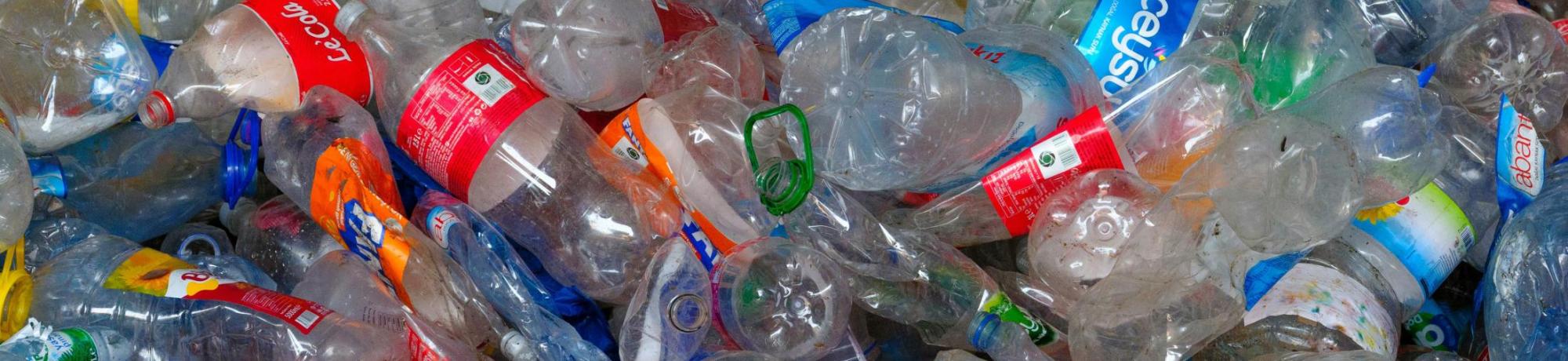 large amount of crushed plastic beverage bottles